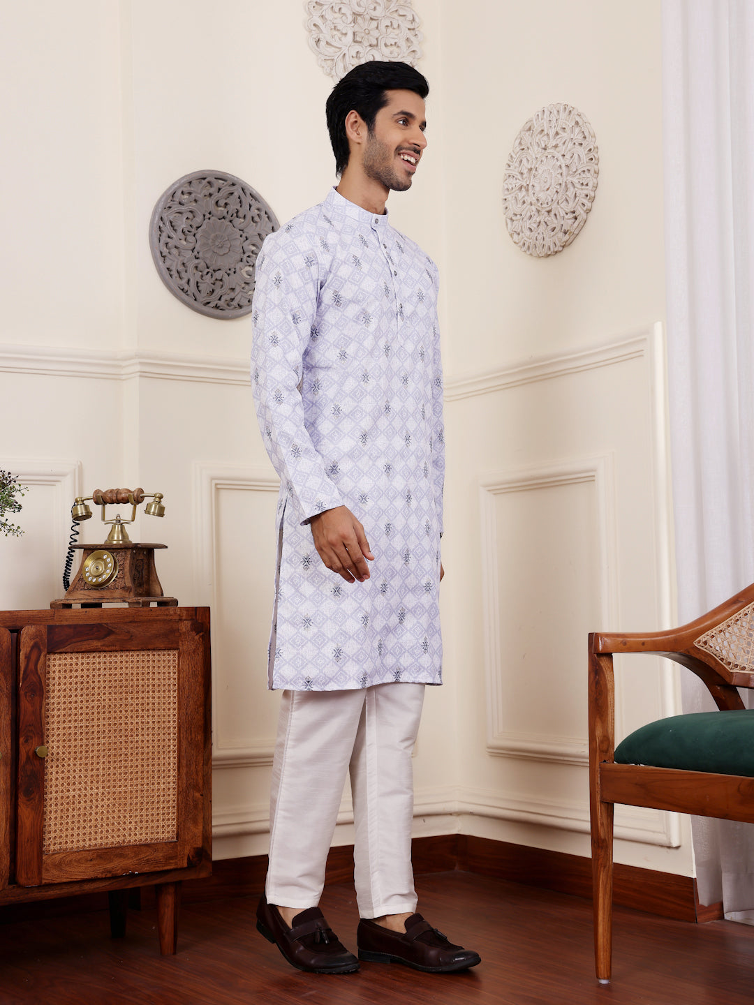 Rawayi light purple kurta with intricate motifs, blending tradition with modern elegance.