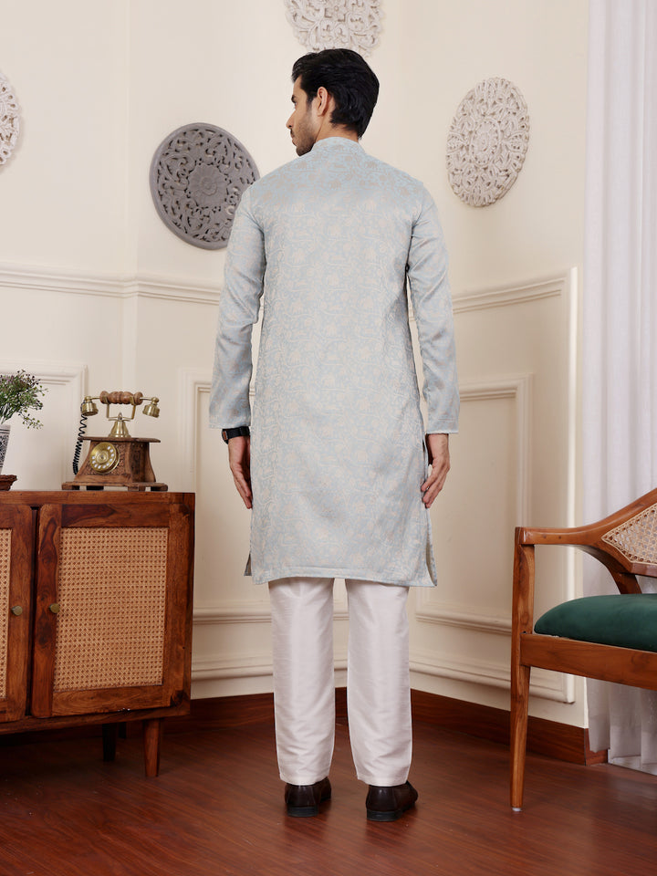 Light blue kurta for men with intricate beige motif detailing, perfect for festivals.