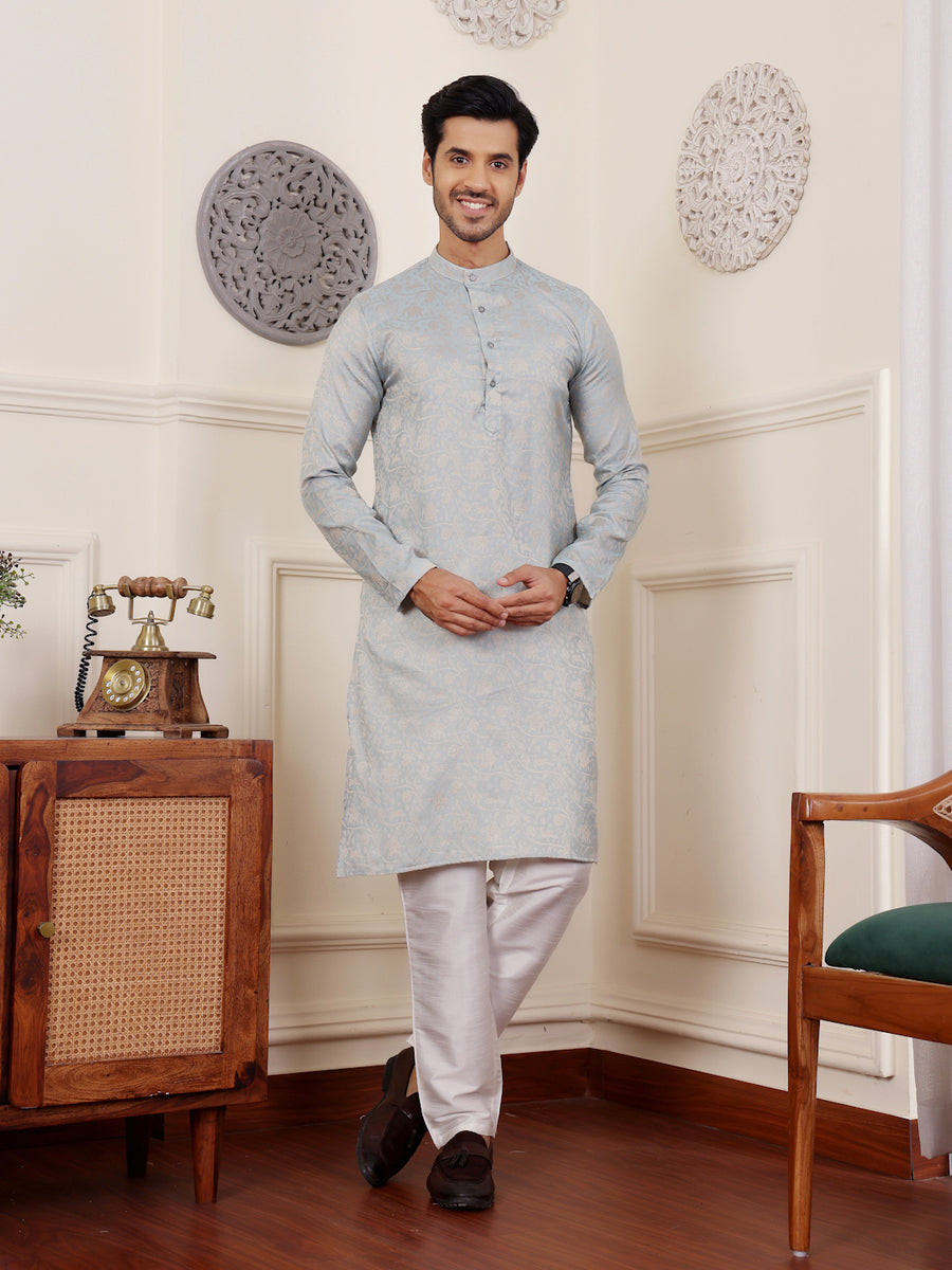 Elegant light blue kurta for men, crafted from premium Viscose fabric with detailed motifs.