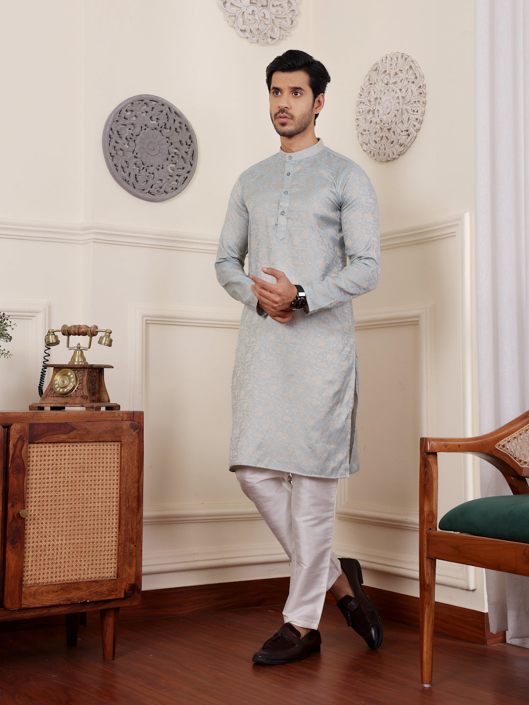 Timeless light blue kurta with delicate beige woven motifs, ideal for formal events.