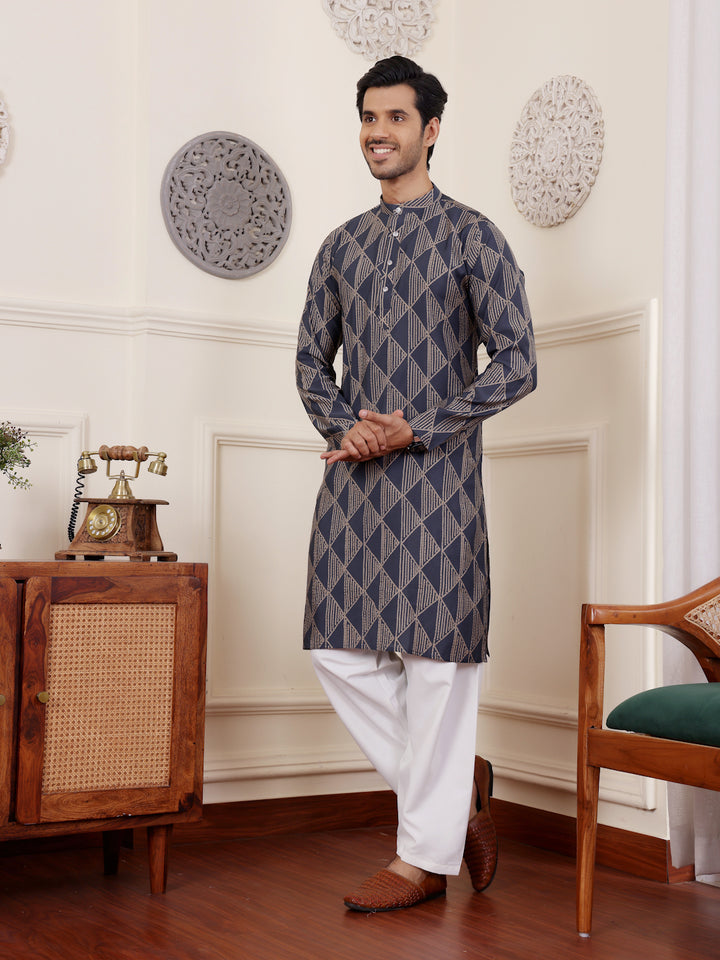 Men's traditional navy blue kurta pajama set with embroidery