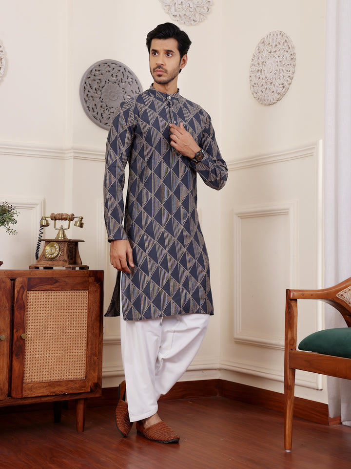 Festive navy blue kurta for men paired with cream silk bottom