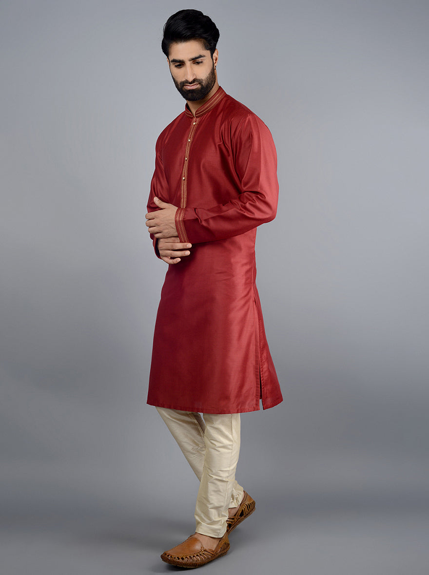 Celebrate in style with a maroon silk blend kurta set, ideal for festive occasions.