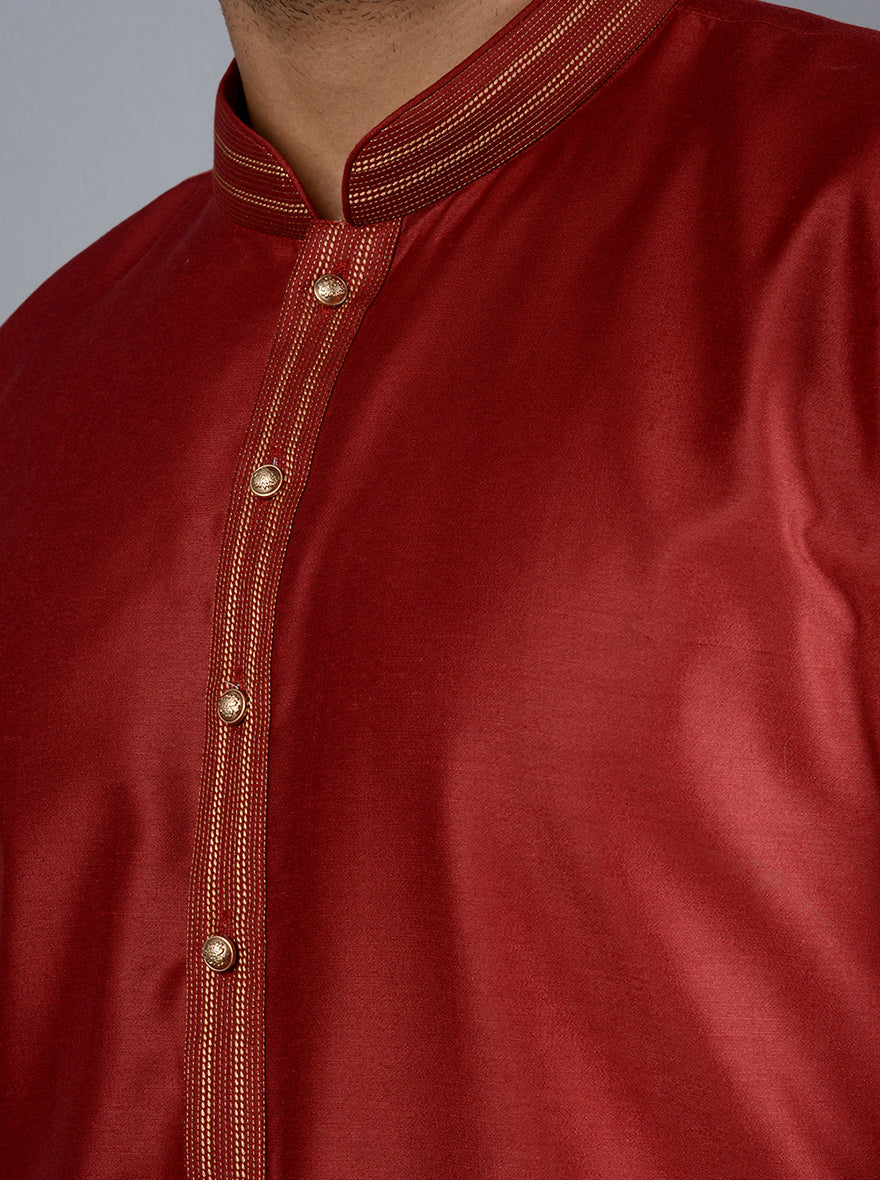 Stylish maroon kurta set crafted from silk blend fabric for festive gatherings.