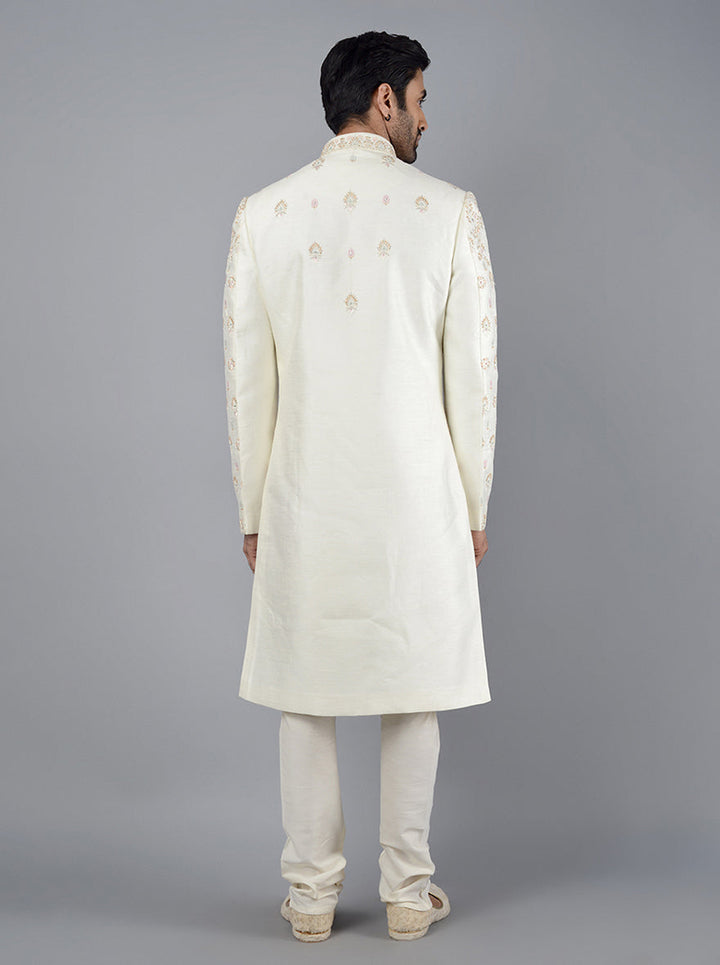 This cream sherwani offers a perfect traditional look, ideal for weddings and special occasions.