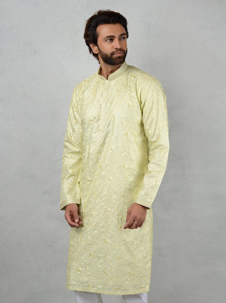 Perfect for festive wardrobes, this Pista Green Kurta Set combines elegance and comfort.