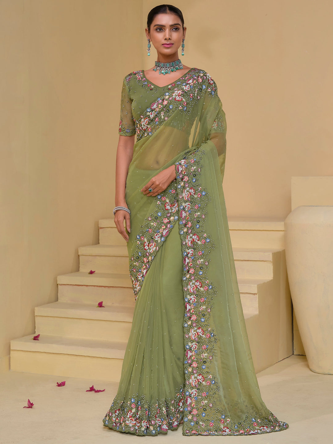 Green silk saree crafted for elegance and style.