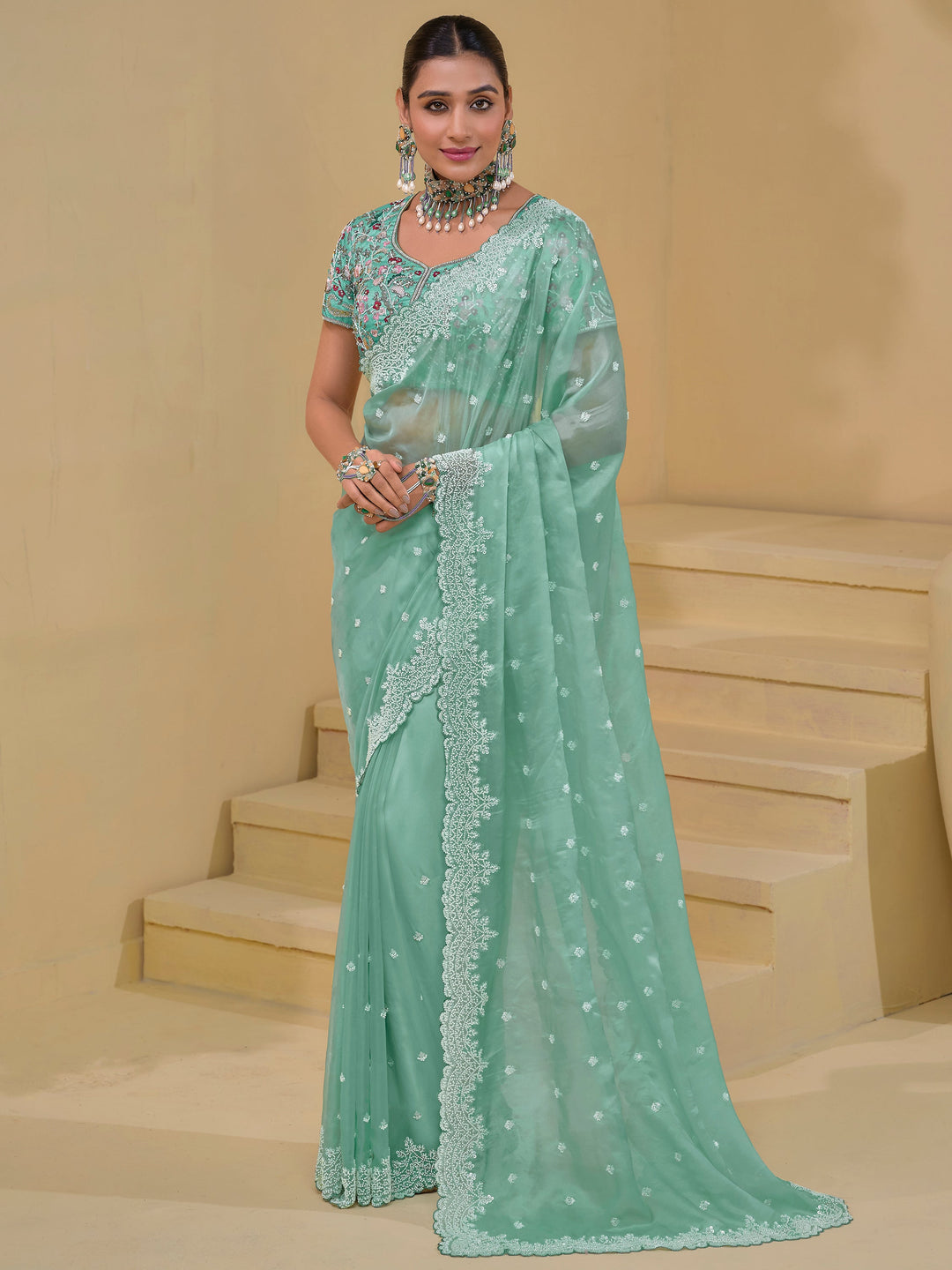 Green silk saree crafted for elegance and style.