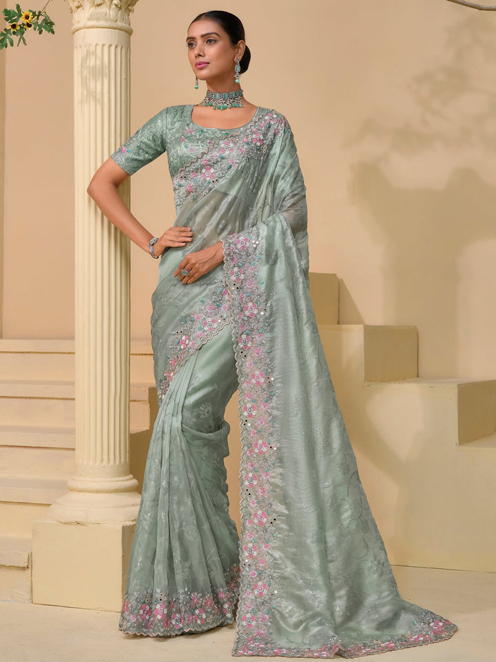 Green silk saree crafted for elegance and style.