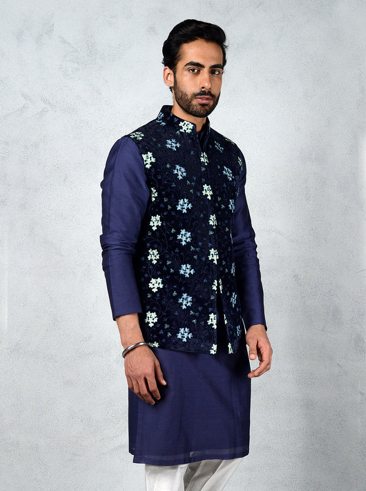 Elegant Navy Blue Bandhgala jacket featuring floral embroidery, perfect for festive gatherings and special occasions.