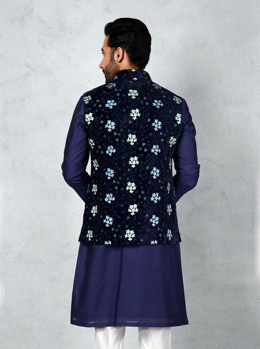 Showcase your style with this Navy Blue Bandhgala jacket, adorned with beautiful floral embroidery for a chic look.