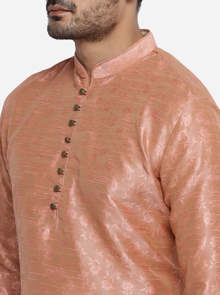 Celebrate in style with our fashionable peach kurta set, designed for special occasions.