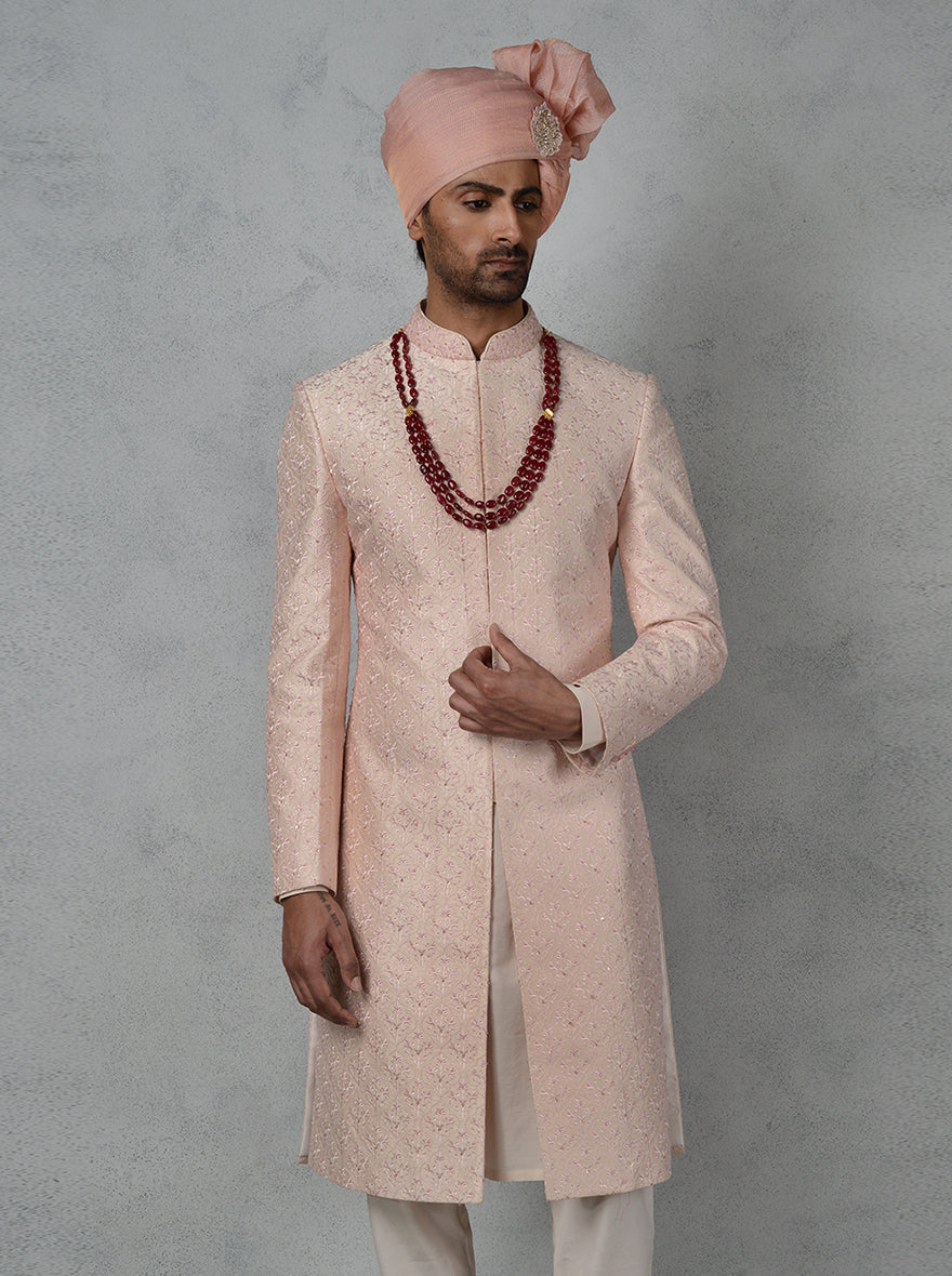 Experience elegance with our collection of pink sherwanis, ideal for modern grooms seeking tradition.