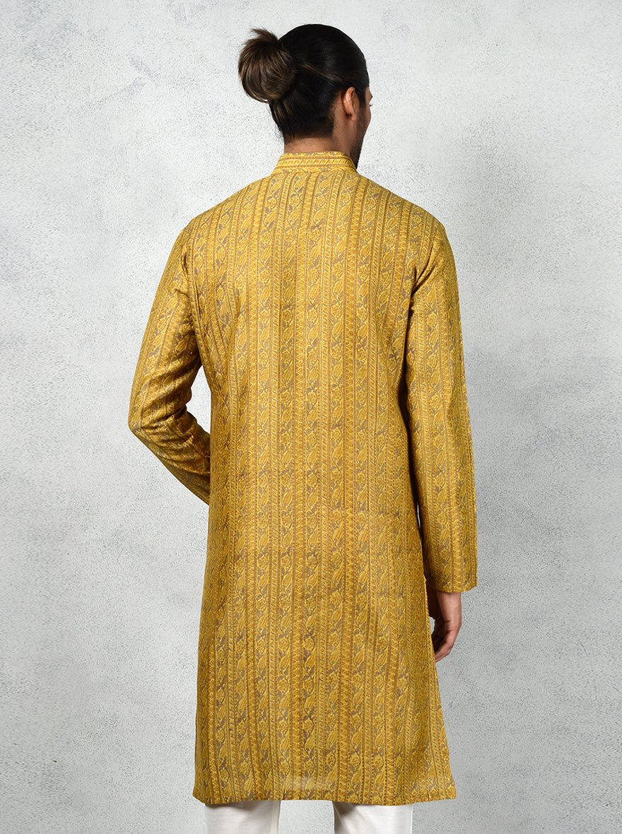 Mustard kurta pajama offers a touch of luxury for Haldi ceremonies, enhancing your look.