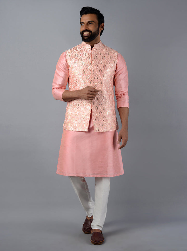 Stylish Pink Bandhgala jacket for men, designed with concealed buttons and sophisticated embroidery details.