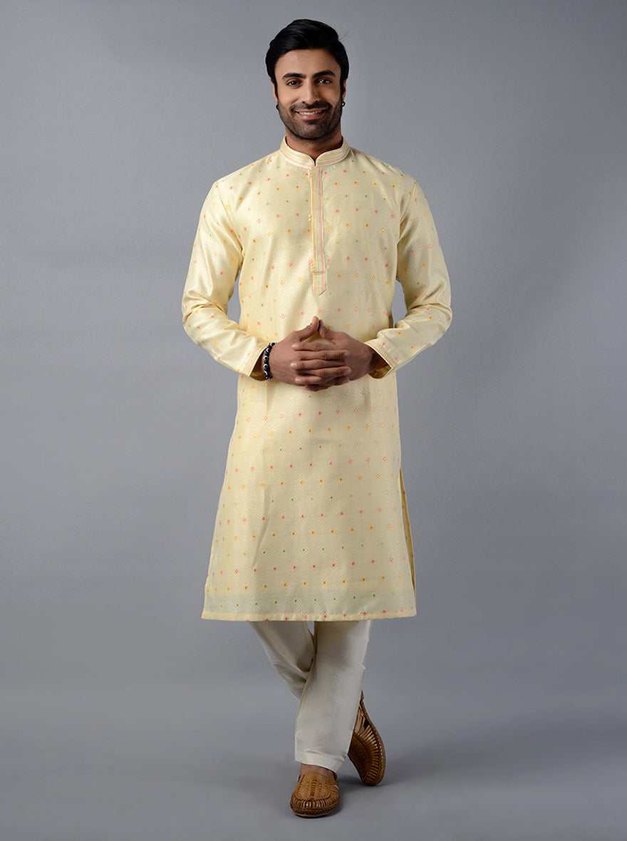 Comfortable cream kurta set made from luxurious jacquard silk, ideal for festive occasions in the USA.