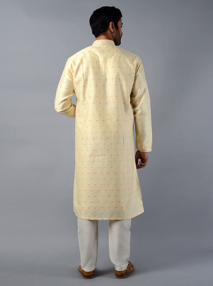 Gleaming cream kurta set crafted from self-designed jacquard silk, elevating your traditional look in the USA.