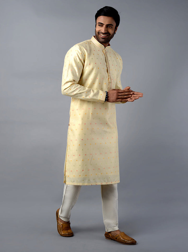 Stylish cream kurta set in jacquard silk fabric, perfect for celebrations and festive gatherings in the USA.