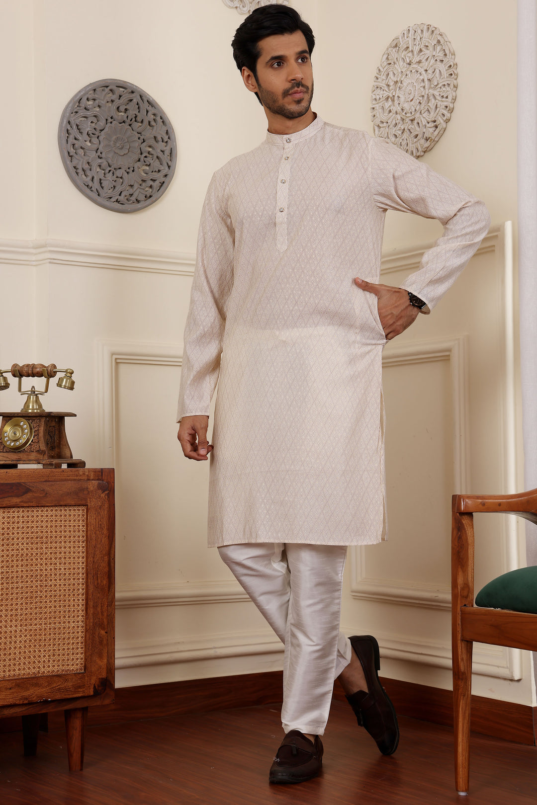 Elegant white kurta pajama set with intricate embroidery for men
