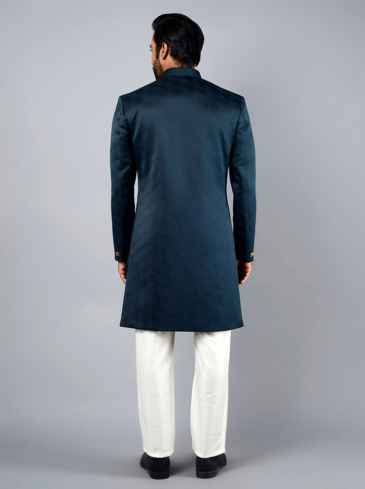 Step out in sophistication with this Deep Peacock Blue Indo Western, tailored for special occasions.