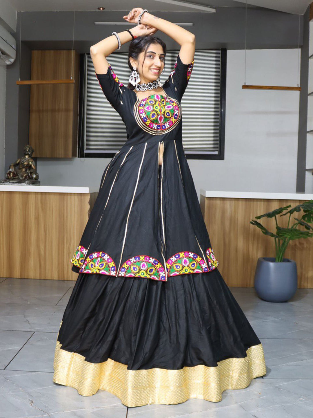 Gorgeous Black Mirror Work Cotton Navratri Lehenga With Long Top