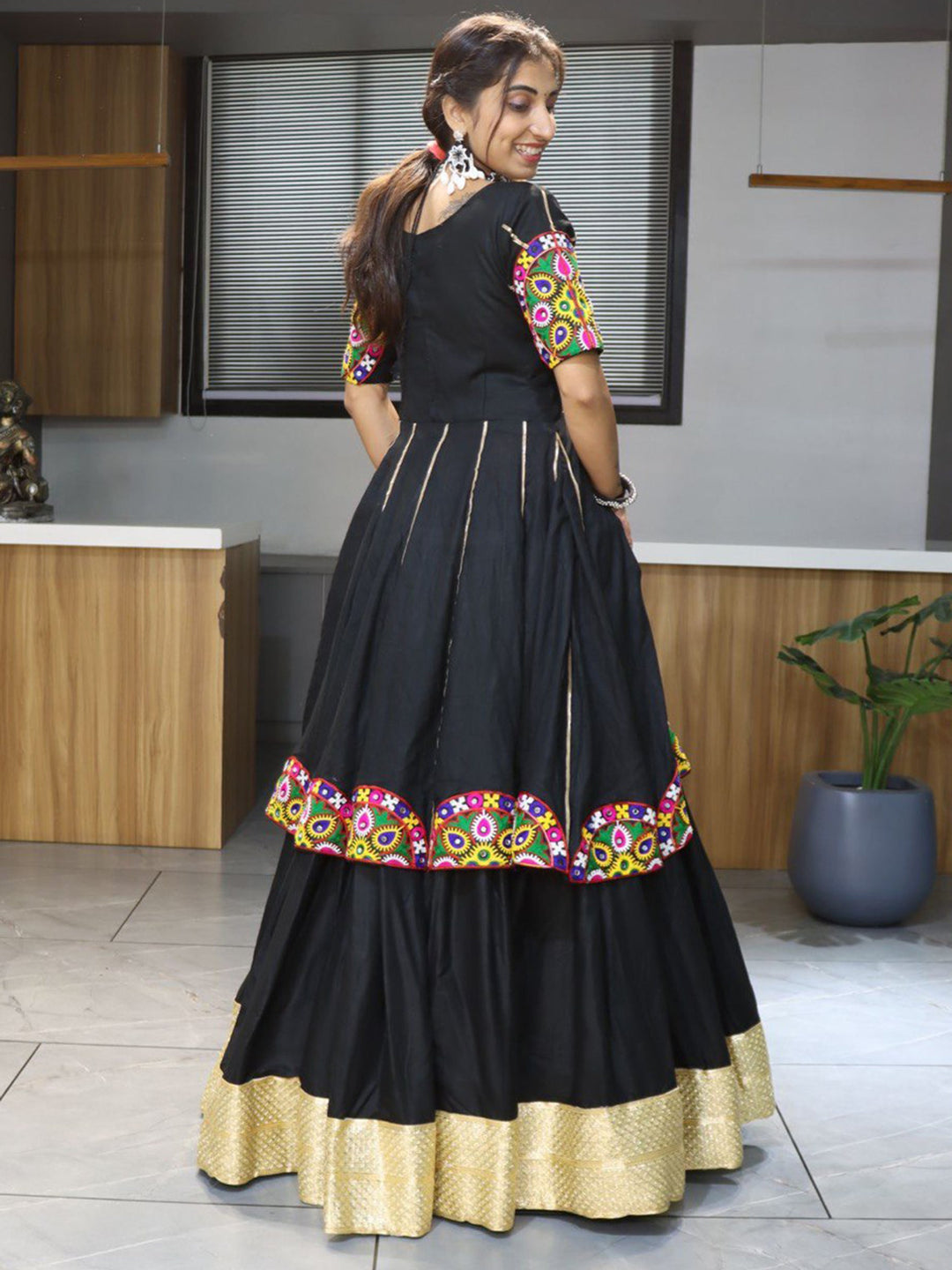 Gorgeous Black Mirror Work Cotton Navratri Lehenga With Long Top