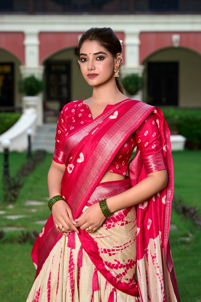 Elegant red Dola silk lehenga set featuring Shibori print and exquisite zari work for weddings and celebrations.