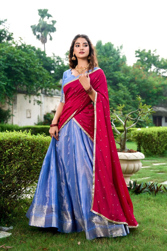 Regal royal-blue Kanchipuram lehenga with rich embroidery, unstitched blouse included.