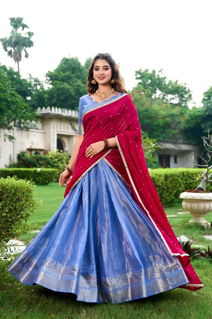 Luxurious royal-blue Kanchipuram lehenga with exquisite patterns, perfect for weddings.