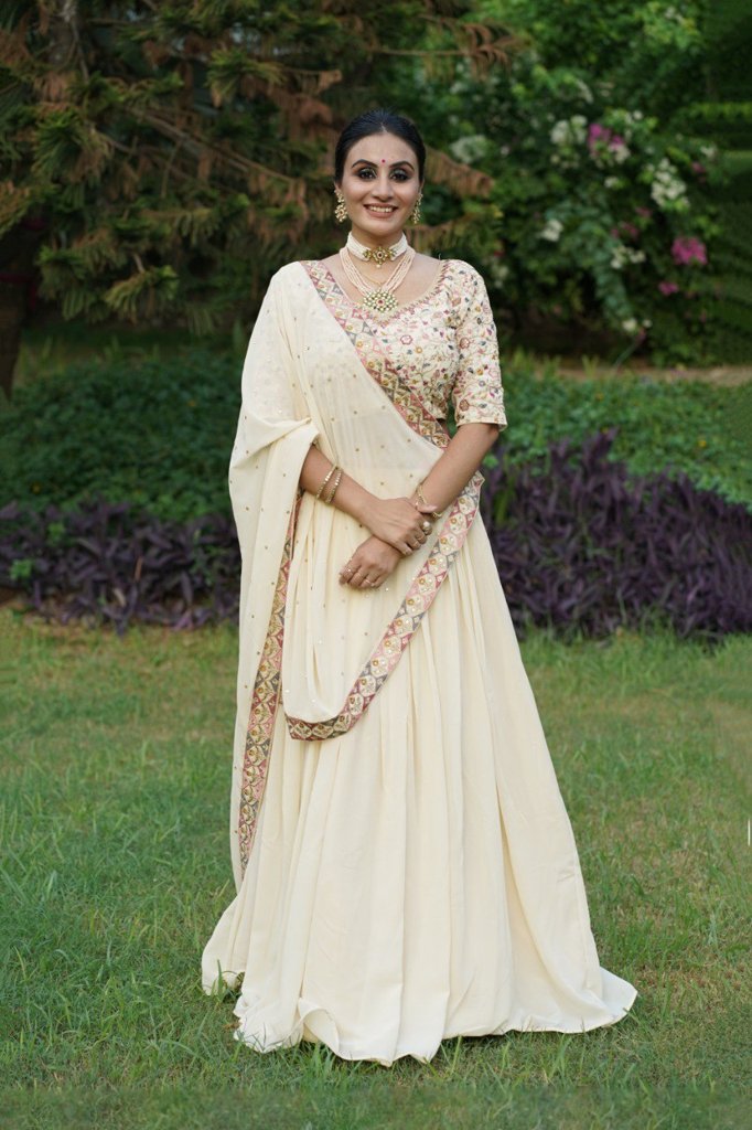 Cream georgette lehenga set with intricate sequin and thread embroidery for USA weddings and festive occasions