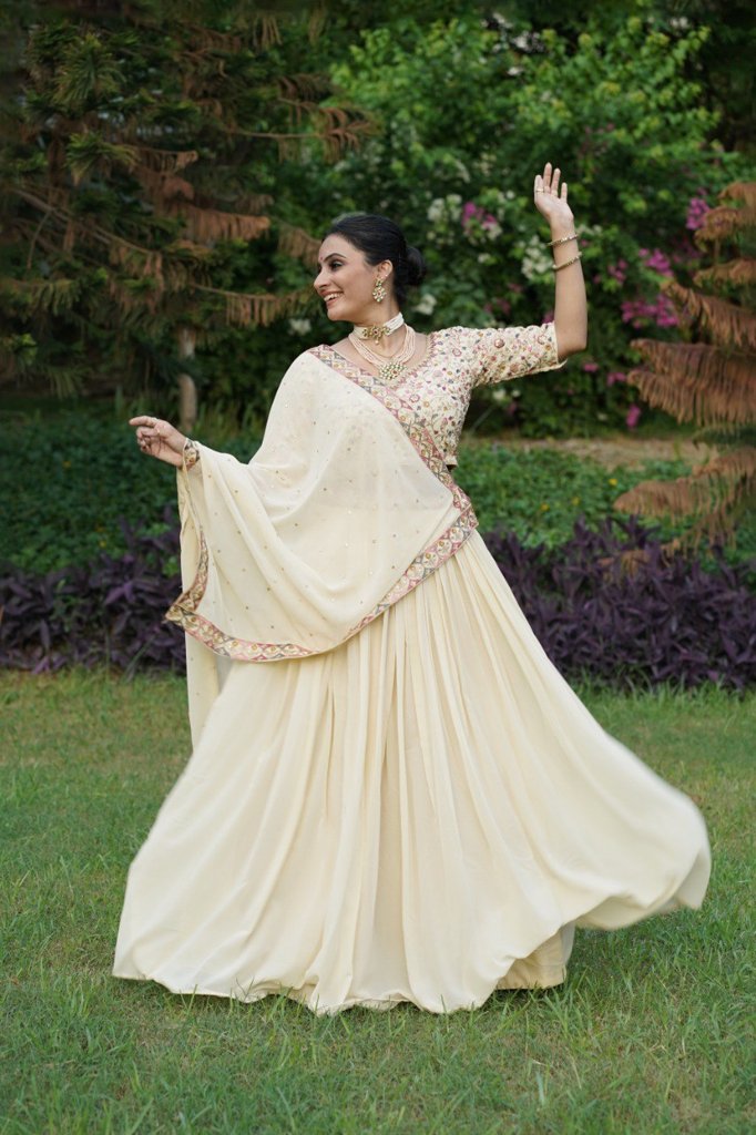 USA-inspired cream georgette lehenga set with shimmering sequin work and matching vichitra silk dupatta