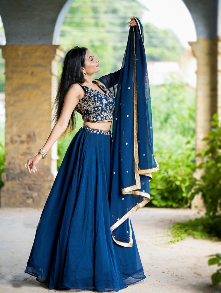 Stunning USA-inspired blue lehenga with delicate sequin detailing, crafted from premium georgette fabric for a luxurious feel