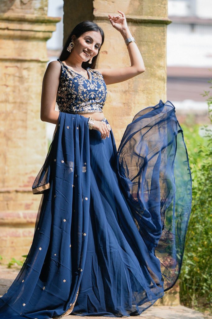 Blue georgette lehenga set with detailed embroidery and shimmering sequins, ideal for American cultural celebrations