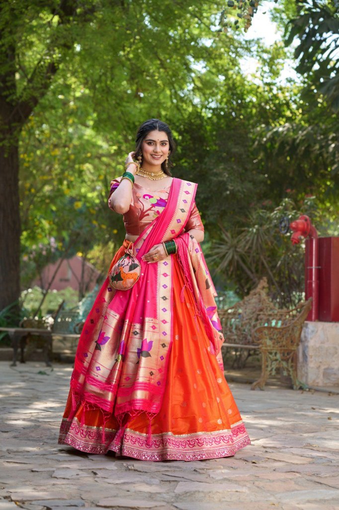 Timeless orange Paithani lehenga set with jacquard silk and a beautifully designed dupatta with batwa for weddings.