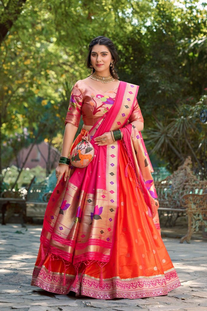 Vibrant orange Paithani lehenga set in jacquard silk with intricate designs, paired with an ethereal dupatta and batwa.