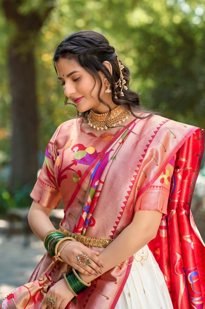 Elegant white Paithani lehenga set in jacquard silk, featuring an exquisite dupatta and matching batwa for bridal wear.