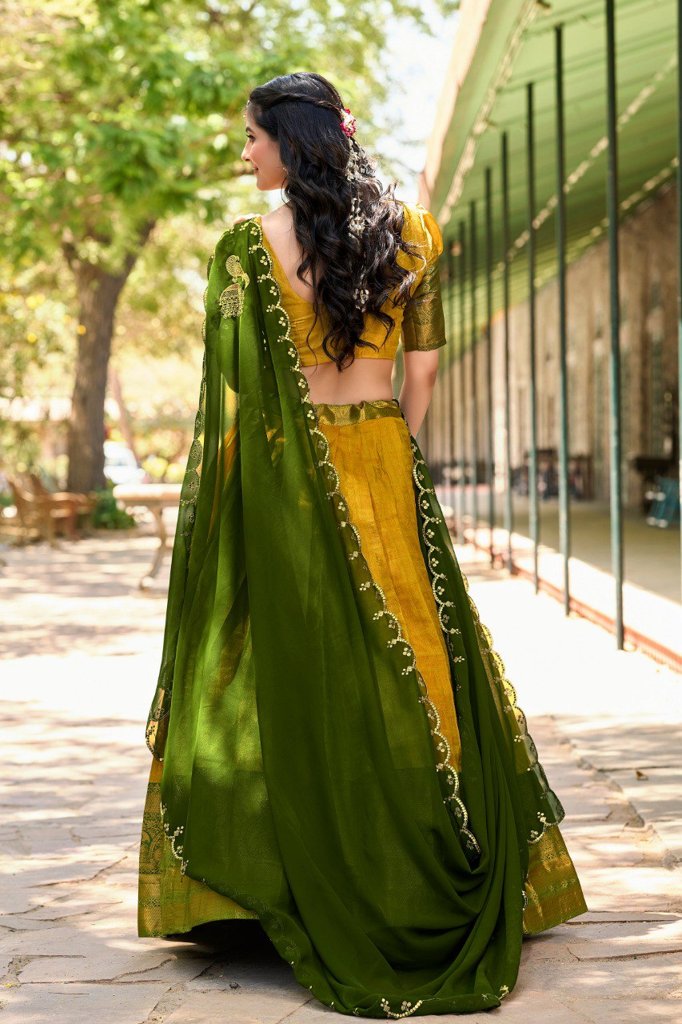 Stunning yellow Kanjivaram Lehenga with a customizable blouse and embroidered dupatta, perfect for USA weddings and festive occasions.