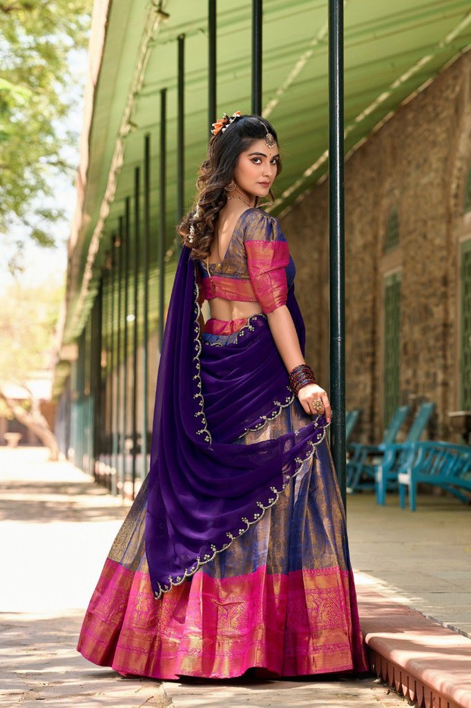 Purple Kanjivaram Lehenga set with a tailored blouse and embroidered dupatta, designed for festive celebrations in the USA.