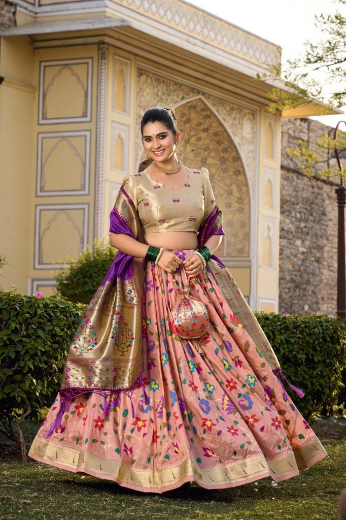 Classic white jacquard silk lehenga with delicate zari detailing, paired with a matching blouse for cultural occasions.