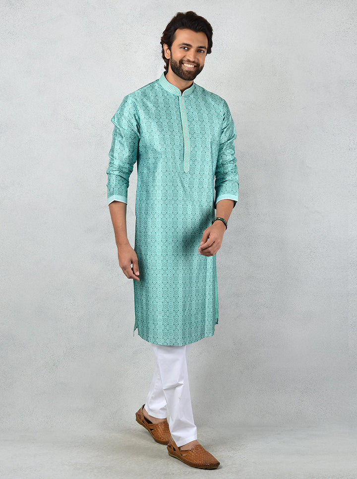 This green kurta set combines traditional design with modern elegance.