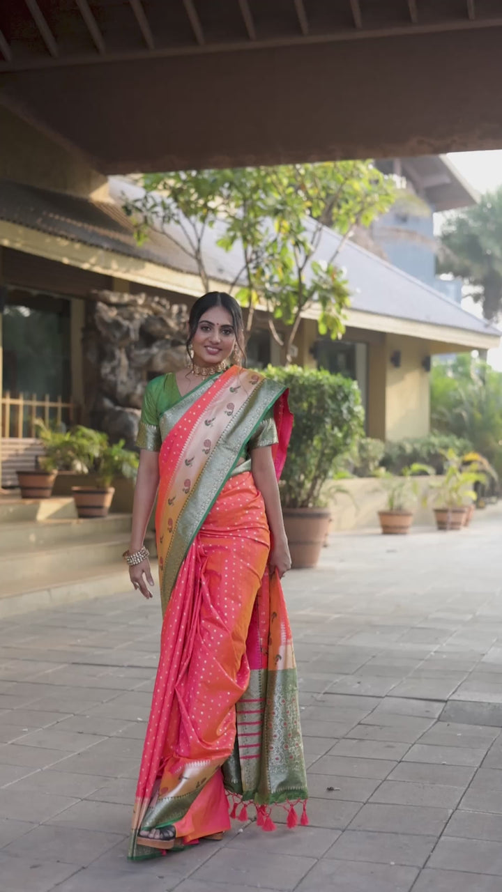 Traditional Peach Indian sadi with peacock border, zari pallu, and matching blouse piece. Perfect for Indian weddings or cultural celebrations.