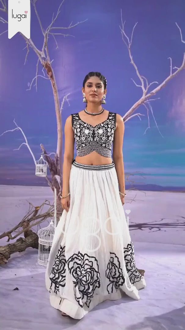 Elegant crop top and skirt lehenga with a floral design, perfect for adding a touch of freshness to your wardrobe