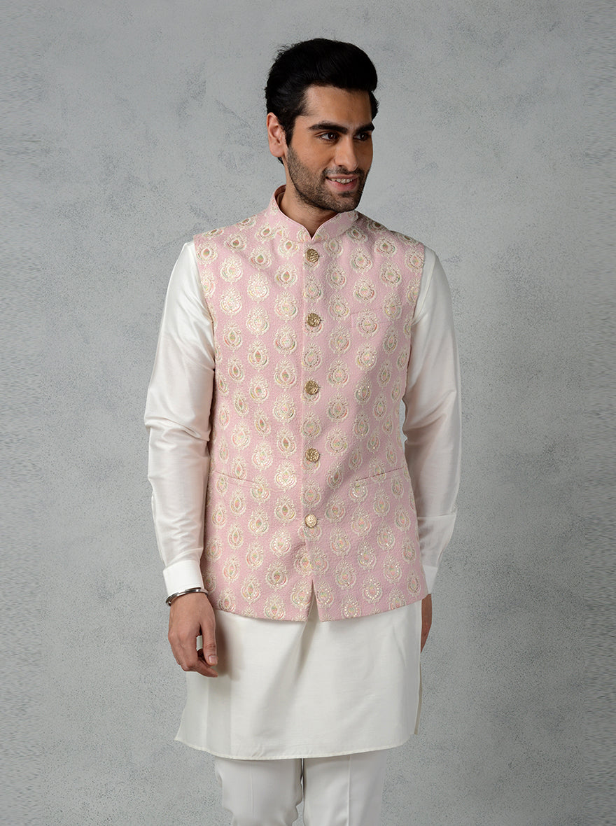 Pink bandhgala jacket in Mysur silk featuring retro floral embroidery and golden textured buttons, perfect for traditional events.