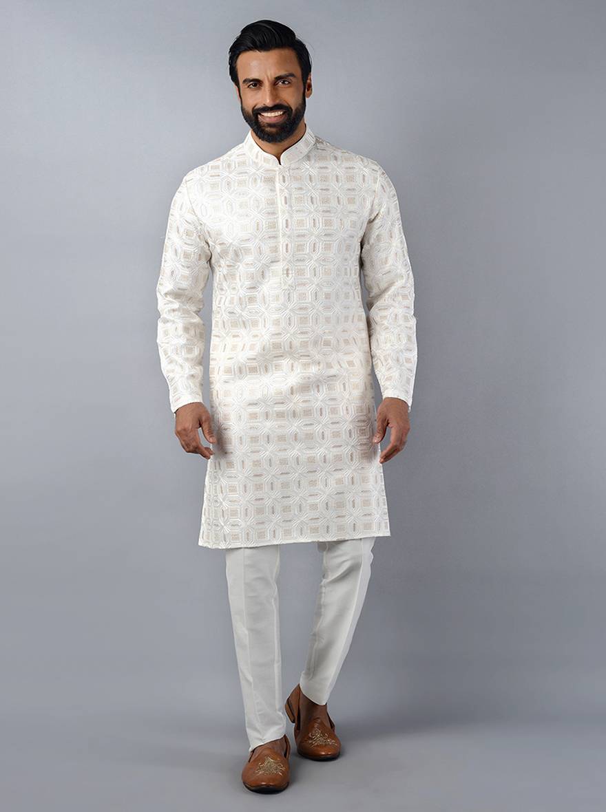 Graceful off-white kurta set in silk blend, showcasing exquisite embroidery for festive occasions in the USA.