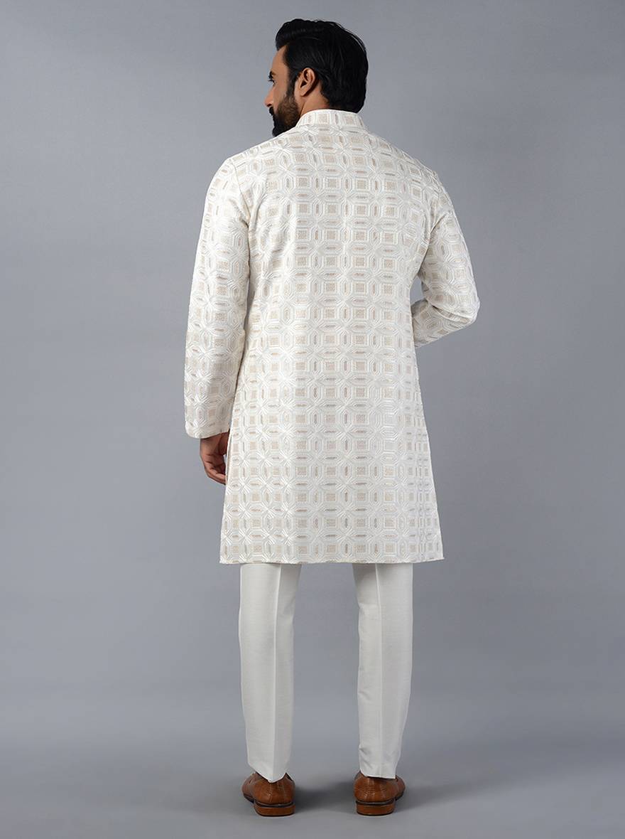 Stylish off-white kurta set crafted from silk blend, featuring sequins embroidery for an elegant look in the USA.