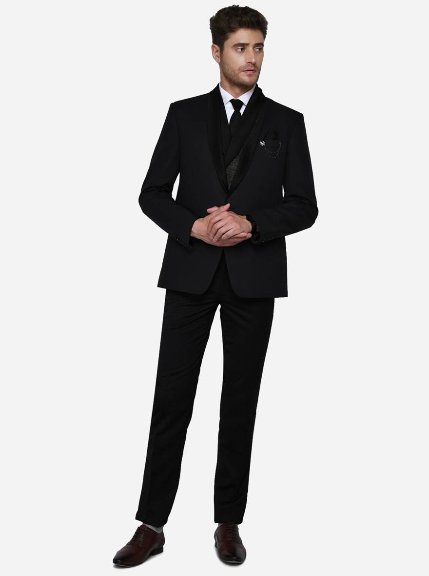 Classic black suit for men, offering stylish comfort for formal occasions, perfect for weddings and special events.