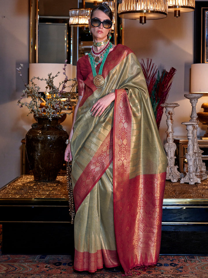 Green silk saree crafted for elegance and style.