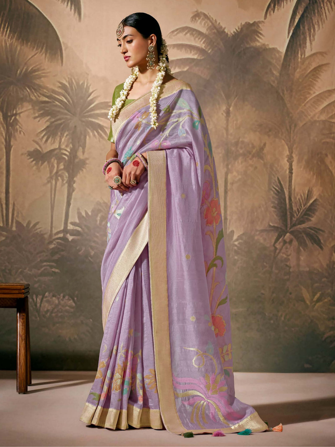 Green silk saree crafted for elegance and style.