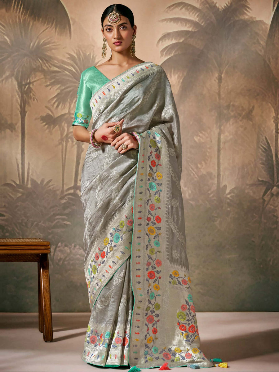 Green silk saree crafted for elegance and style.