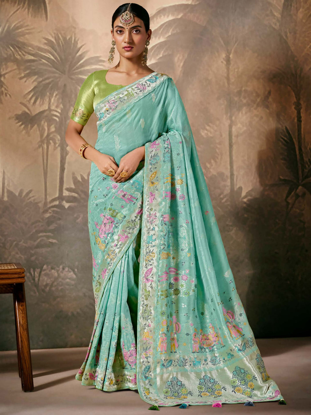 Green silk saree crafted for elegance and style.